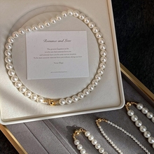 Ши Цзябао Белая магнитная пряжка круглая жемчужная ожерелье женщина 2024 новый свитер цепочка легкая роскошь шея
